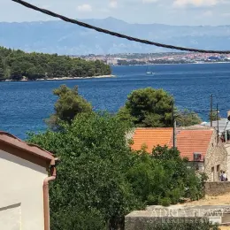 STAVEBNÍ POZEMEK S PŘÍSTUPOVOU CESTOU A VÝHLEDEM NA MOŘE - KALI, UGLJAN nemovitost na prodej