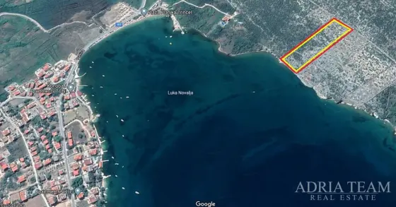 POZEMEK 12.440 m2 U PLÁŽE PLANJKA, 1. ŘADA U MOŘE - STARA NOVALJA, PAG nemovitost na prodej